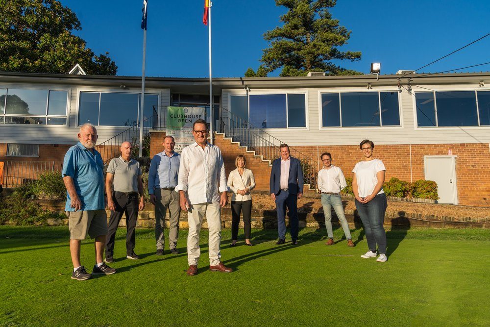Club officials at Marrickville Golf Club, Sydney, celebrate a new lease